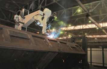 Atvirų vagonų ir vagonečių suvirinimo robotas